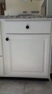 close up of freshly painted white kitchen cabinets, trucare painters