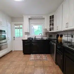 black lower and white upper kitchen cabinets, cabinet refinishing, trucare painters