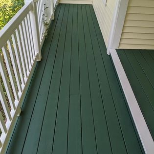 green stained verandah with white railing, deck painting, deck refinishing, trucare painters